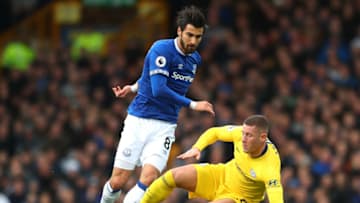 LIVERPOOL, ENGLAND - MARCH 17: Ross Barkley of Chelsea is tackled by Andre Gomes of Everton during the Premier League match between Everton FC and Chelsea FC at Goodison Park on March 17, 2019 in Liverpool, United Kingdom. (Photo by Catherine Ivill/Getty Images)