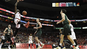 Nov 14, 2016; Louisville, KY, USA; Louisville Cardinals forward Jaylen Johnson (10) dunks against William & Mary Tribe forward Jack Whitman (41) during the second half at KFC Yum! Center. Louisville defeated William & Mary 91-58. Mandatory Credit: Jamie Rhodes-USA TODAY Sports