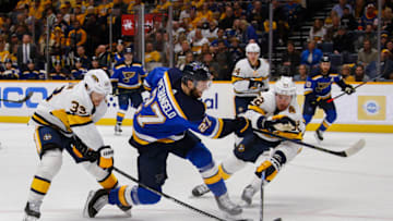 Alex Pietrangelo #27 of the St. Louis Blues takes a shot past Ryan Johansen #92 of the Nashville Predators.(Photo by Frederick Breedon/Getty Images)