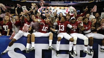 Dec 5, 2015; Atlanta, GA, USA; Alabama Crimson Tide wide receiver Richard Mullaney (16) celebrates with teammates and fans after defeating the Florida Gators in the 2015 SEC Championship Game at the Georgia Dome. Alabama won 29-15. Mandatory Credit: Jason Getz-USA TODAY Sports