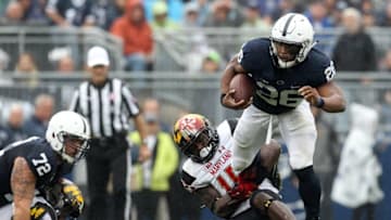 Oct 8, 2016; University Park, PA, USA; Penn State Nittany Lions running back Saquon Barkley (26) runs with the ball during the second quarter against the Maryland Terrapins at Beaver Stadium. Mandatory Credit: Matthew O