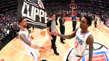 LOS ANGELES, CA - APRIL 3: Austin Rivers #25 and Lou Williams #23 of the LA Clippers after the game against the San Antonio Spurs on April 3, 2018 at STAPLES Center in Los Angeles, California. NOTE TO USER: User expressly acknowledges and agrees that, by downloading and/or using this photograph, user is consenting to the terms and conditions of the Getty Images License Agreement. Mandatory Copyright Notice: Copyright 2018 NBAE (Photo by Andrew D. Bernstein/NBAE via Getty Images)