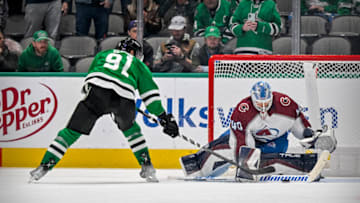Nov 21, 2022; Dallas, Texas, USA; Colorado Avalanche goaltender Alexandar Georgiev (40) stops a shot by Dallas Stars center Tyler Seguin (91) during the overtime shootout at the American Airlines Center. Mandatory Credit: Jerome Miron-USA TODAY Sports