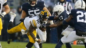 STATE COLLEGE, PA - OCTOBER 27: Mekhi Sargent #10 of the Iowa Hawkeyes is tackled by Garrett Taylor #17 of the Penn State Nittany Lions on October 27, 2018 at Beaver Stadium in State College, Pennsylvania. (Photo by Justin K. Aller/Getty Images)