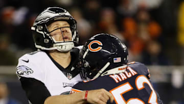 CHICAGO, ILLINOIS - JANUARY 06: Khalil Mack #52 of the Chicago Bears hits Nick Foles #9 of the Philadelphia Eagles in the fourth quarter of the NFC Wild Card Playoff game at Soldier Field on January 06, 2019 in Chicago, Illinois. (Photo by Jonathan Daniel/Getty Images)