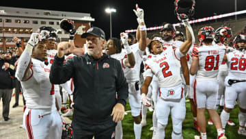 Oct 27, 2022; Pullman, Washington, USA; Utah Utes head coach Kyle Whittingham sings the school fight song with his team after a game against the Washington State Cougars at Gesa Field at Martin Stadium. Utah won 21-17. Mandatory Credit: James Snook-USA TODAY Sports