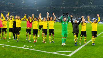 GELSENKIRCHEN, GERMANY - DECEMBER 08: Players of Dortmund celebrates after winning the Bundesliga match between FC Schalke 04 and Borussia Dortmund at the Veltins Arena on December 08, 2018 in Dortmund, Germany. (Photo by TF-Images/TF-Images via Getty Images)