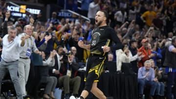 Stephen Curry #30 of the Golden State Warriors reacts after making a three-point shot tying the game with 19 seconds left against the Milwaukee Bucks in the fourth quarter at Chase Center on March 11, 2023 in San Francisco, California. NOTE TO USER: User expressly acknowledges and agrees that, by downloading and or using this photograph, User is consenting to the terms and conditions of the Getty Images License Agreement. (Photo by Thearon W. Henderson/Getty Images)