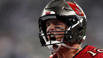 ARLINGTON, TEXAS - SEPTEMBER 11: Tom Brady #12 of the Tampa Bay Buccaneers yells as he takes the field before the game between the Tampa Bay Buccaneers and the Dallas Cowboys at AT&T Stadium on September 11, 2022 in Arlington, Texas. (Photo by Tom Pennington/Getty Images)