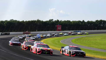 LONG POND, PENNSYLVANIA - JULY 28: Erik Jones, driver of the #20 Reser's Main St Bistro Toyota, leads the field during the Monster Energy NASCAR Cup Series Gander RV 400 at Pocono Raceway on July 28, 2019 in Long Pond, Pennsylvania. (Photo by Jared C. Tilton/Getty Images)