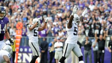 Oct 2, 2016; Baltimore, MD, USA; Oakland Raiders linebacker Daren Bates (56) reacts after a turnover on downs by the Baltimore Ravens in the fourth quarter at M&T Bank Stadium. Mandatory Credit: Evan Habeeb-USA TODAY Sports