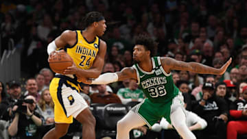 Boston Celtics guard Marcus Smart (36) defends Indiana Pacers guard Buddy Hield. Mandatory Credit: Bob DeChiara-USA TODAY Sports