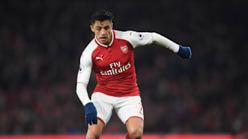 LONDON, ENGLAND - DECEMBER 02: Alexis Sanchez of Arsenal runs with the ball during the Premier League match between Arsenal and Manchester United at Emirates Stadium on December 2, 2017 in London, England. (Photo by Laurence Griffiths/Getty Images)