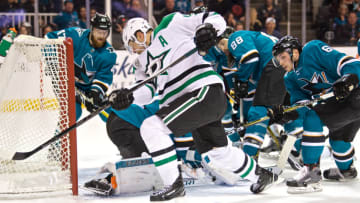 SAN JOSE, CA - FEBRUARY 18: Stars center Jason Spezza (90) and Sharks center Daniel O'Regan (65) battle for the puck during the NHL game between the San Jose Sharks and the Dallas Stars on February 18, 2018, at the SAP Center in San Jose, CA. (Photo by Matt Cohen/Icon Sportswire via Getty Images)