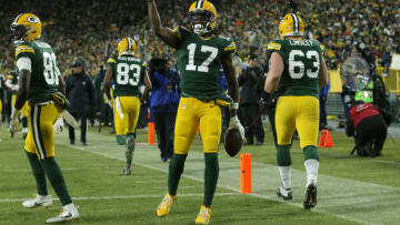GREEN BAY, WISCONSIN - JANUARY 12: Davante Adams #17 of the Green Bay Packers celebrates after scoring a touchdown against the Seattle Seahawks in the first quarter of the NFC Divisional Playoff game at Lambeau Field on January 12, 2020 in Green Bay, Wisconsin. (Photo by Dylan Buell/Getty Images)
