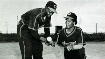 INDIANAPOLIS, IN - CIRCA 1950: Teammates on the Indianapolis Clowns of the National Negro Leagues pose for a photograph around 1950 in Indianapolis, Indiana. (Photo Reproduction by Transcendental Graphics/Getty Images)