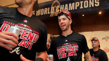 ATLANTA, GA - SEPTEMBER 22: Dansby Swanson #7 of the Atlanta Braves celebrates with champagne after clinching the NL East Division against the Philadelphia Phillies at SunTrust Park on September 22, 2018 in Atlanta, Georgia. (Photo by Daniel Shirey/Getty Images)