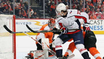 PHILADELPHIA, PA - NOVEMBER 13: Carter Hart #79 of the Philadelphia Flyers makes a skate save as T.J. Oshie #77 of the Washington Capitals attempts a scoring chance on the rebound on November 13, 2019 at the Wells Fargo Center in Philadelphia, Pennsylvania. (Photo by Len Redkoles/NHLI via Getty Images)