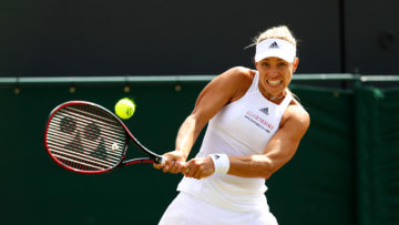 LONDON, ENGLAND - JULY 08: Angelique Kerber of Germany plays a backhand during the Ladies Singles third round match against Shelby Rogers of The United States on day six of the Wimbledon Lawn Tennis Championships at the All England Lawn Tennis and Croquet Club on July 8, 2017 in London, England. (Photo by Michael Steele/Getty Images)