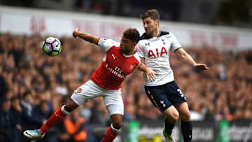 LONDON, ENGLAND - APRIL 30: Alex Oxlade-Chamberlain of Arsenal attempts to control the ball while under pressure from Ben Davies of Tottenham Hotspur during the Premier League match between Tottenham Hotspur and Arsenal at White Hart Lane on April 30, 2017 in London, England. (Photo by Shaun Botterill/Getty Images)