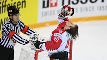 Belarus' goalkeeper Alexei Kolosov (R) reacts during the IIHF Men's Ice Hockey World Championships preliminary round group A match between Russia and Belarus, at the Olympic Sports Centre in Riga, Latvia, on June 1, 2021. (Photo by Gints IVUSKANS / AFP) (Photo by GINTS IVUSKANS/AFP via Getty Images)