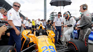 INDIANAPOLIS, IN - MAY 28: Fernando Alonso of Spain, driver of the #29 McLaren-Honda-Andretti Honda, climbs into his car ahead of the 101st running of the Indianapolis 500 at Indianapolis Motorspeedway on May 28, 2017 in Indianapolis, Indiana. (Photo by Jamie Squire/Getty Images)