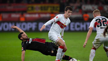 LEVERKUSEN, GERMANY - NOVEMBER 23: Kevin Volland of Leverkusen and Benjamin Pavard of Stuttgart battle for the ball during the Bundesliga match between Bayer 04 Leverkusen and VfB Stuttgart at BayArena on November 23, 2018 in Leverkusen, Germany. (Photo by TF-Images/Getty Images)