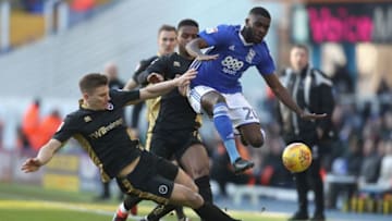 BIRMINGHAM, ENGLAND - FEBRUARY 17: Shaun Hutchinson of Millwall tackles Jeremie Boga of Birmingham during the Sky Bet Championship match between Birmingham City and Millwall at St Andrews (stadium) on February 17, 2018 in Birmingham, England. (Photo by Christopher Lee/Getty Images)