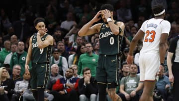 Mar 5, 2023; Boston, Massachusetts, USA; Boston Celtics forward Jayson Tatum (0) and guard Derrick White (9) react to a foul being called against the Celtics during the overtime period against the New York Knicks at TD Garden. Mandatory Credit: Winslow Townson-USA TODAY Sports