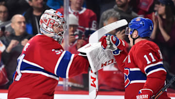 MONTREAL, QC - FEBRUARY 03: Goaltender Carey Price #31 of the Montreal Canadiens congratulates teammate Brendan Gallagher #11 for their victory against the Edmonton Oilers during the NHL game at the Bell Centre on February 3, 2019 in Montreal, Quebec, Canada. The Montreal Canadiens defeated the Edmonton Oilers 4-3 in overtime. (Photo by Minas Panagiotakis/Getty Images)