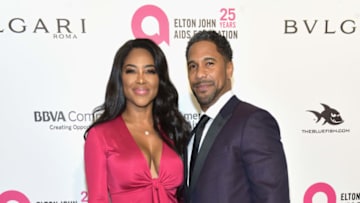 WEST HOLLYWOOD, CA - MARCH 04: (L-R) Kenya Moore and Marc Daly attend the 26th annual Elton John AIDS Foundation's Academy Awards Viewing Party at The City of West Hollywood Park on March 4, 2018 in West Hollywood, California. (Photo by Rodin Eckenroth/Getty Images)