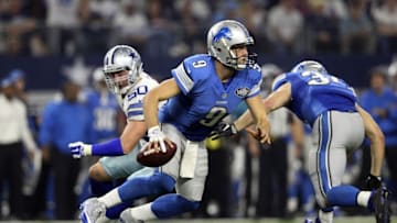 Dec 26, 2016; Arlington, TX, USA; Detroit Lions quarterback Matthew Stafford (9) is chased by Dallas Cowboys outside linebacker Sean Lee (50) during the second half at AT&T Stadium. Mandatory Credit: Kevin Jairaj-USA TODAY Sports