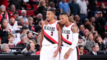 PORTLAND, OR - NOVEMBER 15: CJ McCollum #3 and Damian Lillard #0 of the Portland Trail Blazers during the game against the Orlando Magic on November 15, 2017 at the Moda Center in Portland, Oregon. NOTE TO USER: User expressly acknowledges and agrees that, by downloading and or using this photograph, user is consenting to the terms and conditions of the Getty Images License Agreement. Mandatory Copyright Notice: Copyright 2017 NBAE (Photo by Sam Forencich/NBAE via Getty Images)