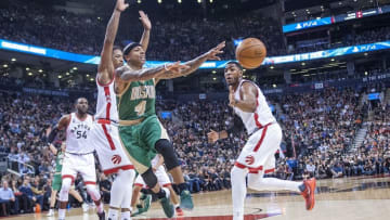 Mar 18, 2016; Toronto, Ontario, CAN; Boston Celtics guard Isaiah Thomas (4) passes against Toronto Raptors in the third quarter at Air Canada Centre. Raptors beat Celtics 105 - 91. Mandatory Credit: Peter Llewellyn-USA TODAY Sports