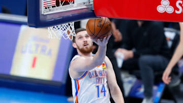 Apr 8, 2021; Oklahoma City, Oklahoma, USA; Oklahoma City Thunder guard Svi Mykhailiuk (14) goes to the basket against the Cleveland Cavaliers during the first quarter at Chesapeake Energy Arena. Mandatory Credit: Alonzo Adams-USA TODAY Sports