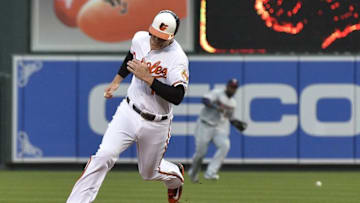Apr 4, 2016; Baltimore, MD, USA; Baltimore Orioles first baseman Chris Davis (19) advances to third base on right fielder Mark Trumbo (not pictured) single during the first inning against the Minnesota Twins at Oriole Park at Camden Yards. Mandatory Credit: Tommy Gilligan-USA TODAY Sports
