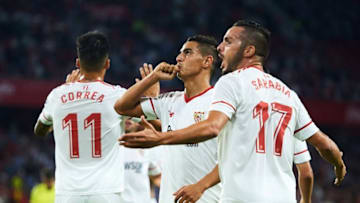 SEVILLE, SPAIN - OCTOBER 28: Wissam Ben Yedder of Sevilla FC (C) celebrates after scoring the first goal for Sevilla FC with Pablo Sarabia of Sevilla FC (R) during the La Liga match between Sevilla and Leganes at Estadio Sanchez Pizjuan on October 28, 2017 in Seville, Spain. (Photo by Aitor Alcalde Colomer/Getty Images)