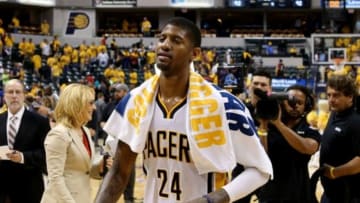 May 28, 2014; Indianapolis, IN, USA; Indiana Pacers forward Paul George (24) leaves the court after game five against the Miami Heat of the Eastern Conference Finals of the 2014 NBA Playoffs at Bankers Life Fieldhouse. Indiana defeats Miami 93-90. Mandatory Credit: Brian Spurlock-USA TODAY Sports