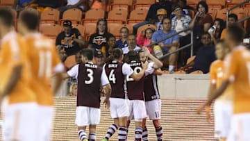Oct 8, 2016; Houston, TX, USA; Colorado Rapids midfielder Shkelzen Gashi (11) celebrates with teammates after scoring a goal during the second half against the Houston Dynamo at BBVA Compass Stadium. The Rapids won 3-2. Mandatory Credit: Troy Taormina-USA TODAY Sports