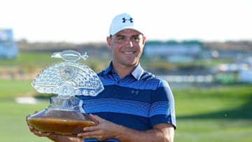 SCOTTSDALE, AZ - FEBRUARY 04: Gary Woodland poses with the trophy after winning the Waste Management Phoenix Open at TPC Scottsdale on February 4, 2018 in Scottsdale, Arizona. (Photo by Robert Laberge/Getty Images)