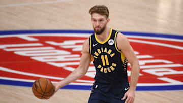 Feb 11, 2021; Detroit, Michigan, USA; Indiana Pacers forward Domantas Sabonis (11) controls the ball against the Detroit Pistons during the third quarter at Little Caesars Arena. Mandatory Credit: Tim Fuller-USA TODAY Sports