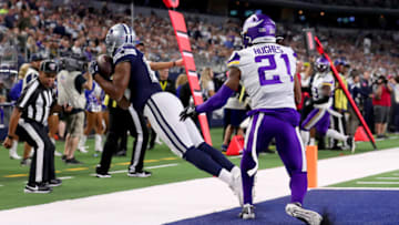 ARLINGTON, TEXAS - NOVEMBER 10: Amari Cooper #19 of the Dallas Cowboys pulls in a pass for a touchdown against Mike Hughes #21 of the Minnesota Vikings in the second half at AT&T Stadium on November 10, 2019 in Arlington, Texas. (Photo by Tom Pennington/Getty Images)