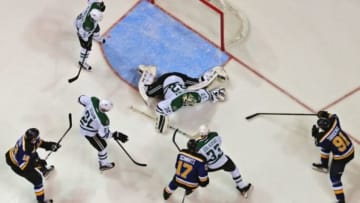 Feb 16, 2016; St. Louis, MO, USA; Dallas Stars goalie Kari Lehtonen (32) stops a shot as center Tyler Seguin (91) and defenseman Alex Goligoski (33) defend against St. Louis Blues center Jori Lehtera (12) left wing Jaden Schwartz (17) and St. Louis Blues right wing Vladimir Tarasenko (91) during the third period at the Scottrade Center. The Blues defeated the Stars 2-1 in overtime. Mandatory Credit: Jeff Curry-USA TODAY Sports