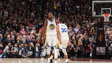CLEVELAND, OH - JUNE 6: Stephen Curry #30 and Draymond Green #23 celebrate and yell with Kevin Durant #35 of the Golden State Warriors after hitting a three point basket against the Cleveland Cavaliers in Game Three of the 2018 NBA Finals on June 6, 2018 at Quicken Loans Arena in Cleveland, Ohio. NOTE TO USER: User expressly acknowledges and agrees that, by downloading and/or using this Photograph, user is consenting to the terms and conditions of the Getty Images License Agreement. Mandatory Copyright Notice: Copyright 2018 NBAE (Photo by Andrew D. Bernstein/NBAE via Getty Images)