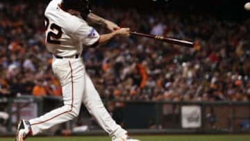 Sep 16, 2015; San Francisco, CA, USA; San Francisco Giants starting pitcher Jake Peavy (22) hits a solo home run against the Cincinnati Reds in the fourth inning of their MLB baseball game at AT&T Park. Mandatory Credit: Lance Iversen-USA TODAY Sports
