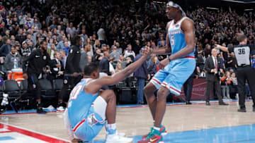SACRAMENTO, CA - MARCH 1: De'Aaron Fox #5 of the Sacramento Kings helps Harrison Barnes #40 of the Sacramento Kings to his feet against the LA Clippers on March 1, 2019 at Golden 1 Center in Sacramento, California. NOTE TO USER: User expressly acknowledges and agrees that, by downloading and or using this Photograph, user is consenting to the terms and conditions of the Getty Images License Agreement. Mandatory Copyright Notice: Copyright 2019 NBAE (Photo by Rocky Widner/NBAE via Getty Images)