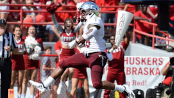 LINCOLN, NE - SEPTEMBER 15: Running back B.J. Smith #26 of the Troy Trojans scores on a run in the first half against the Nebraska Cornhuskers at Memorial Stadium on September 15, 2018 in Lincoln, Nebraska. (Photo by Steven Branscombe/Getty Images)