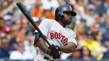 Aug 9, 2015; Detroit, MI, USA; Boston Red Sox center fielder Jackie Bradley Jr. (25) hits a three RBI triple in the eighth inning against the Detroit Tigers at Comerica Park. Mandatory Credit: Rick Osentoski-USA TODAY Sports