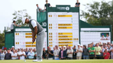 LYTHAM ST ANNES, ENGLAND - JULY 21: Tiger Woods of the United States hits a putt on the 11th green during the third round of the 141st Open Championship at Royal Lytham & St. Annes Golf Club on July 21, 2012 in Lytham St Annes, England. (Photo by Ross Kinnaird/Getty Images)