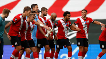 SOUTHAMPTON, ENGLAND - JULY 26: Southampton players celebrate at the end of the Premier League match between Southampton FC and Sheffield United at St Mary's Stadium on July 26, 2020 in Southampton, England. Football Stadiums around Europe remain empty due to the Coronavirus Pandemic as Government social distancing laws prohibit fans inside venues resulting in all fixtures being played behind closed doors. (Photo by Andrew Boyers/Pool via Getty Images)